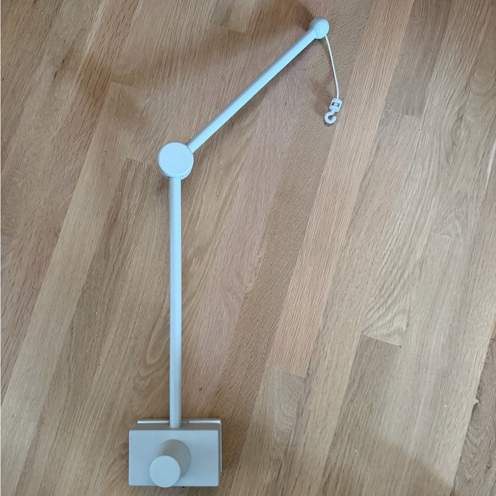 Grey pottery barn crib mobile arm
